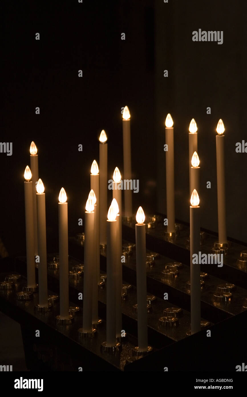 Electric Church candles against a dark background Stock Photo Alamy