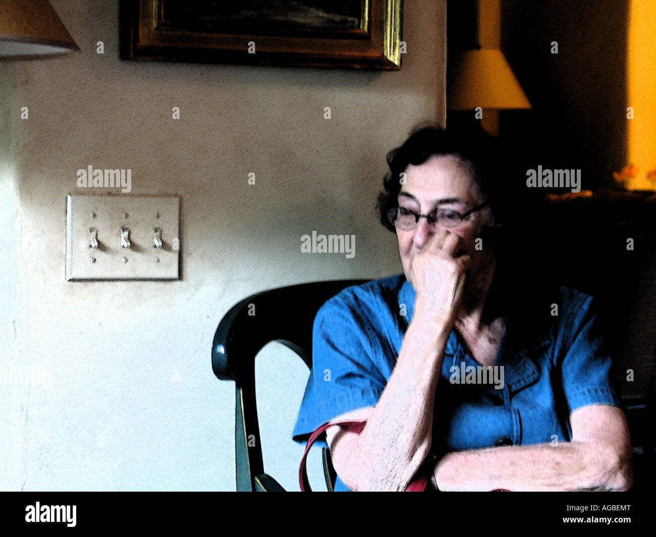 Old lady sitting in a chair hi-res stock photography and images - Alamy