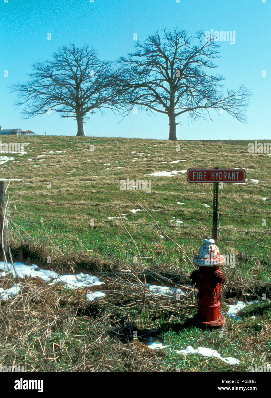 Fire hydrant with sign to locate during heavy snow Stock Photo