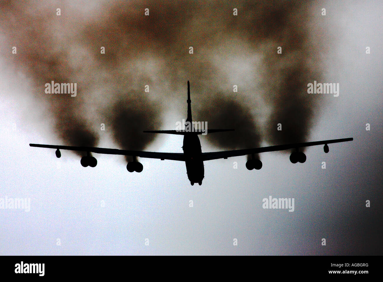 Boeing B52 Stratofortress bomber smokey engines Stock Photo