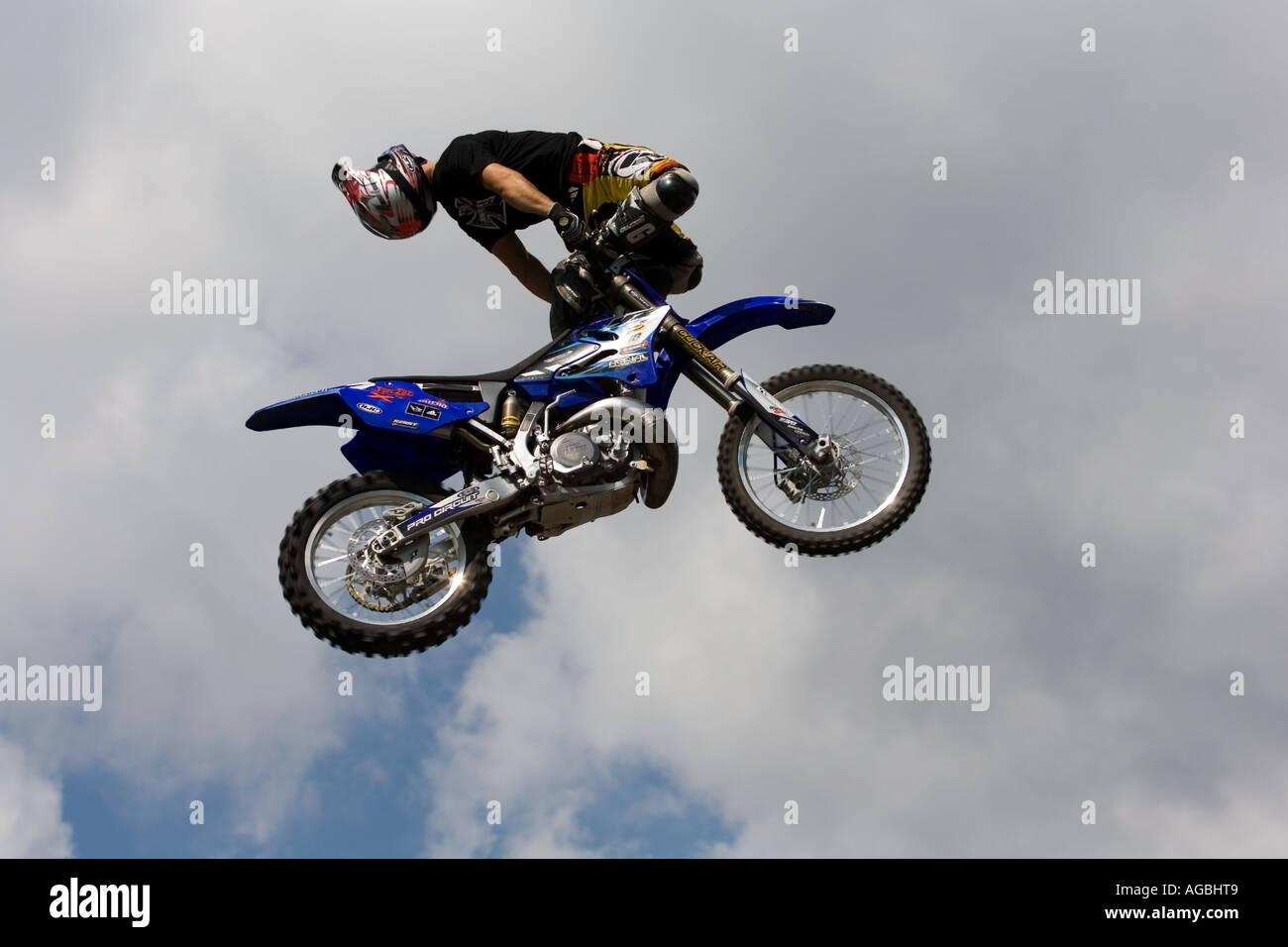 Spectacular jump and style with a motorbike Stock Photo Alamy