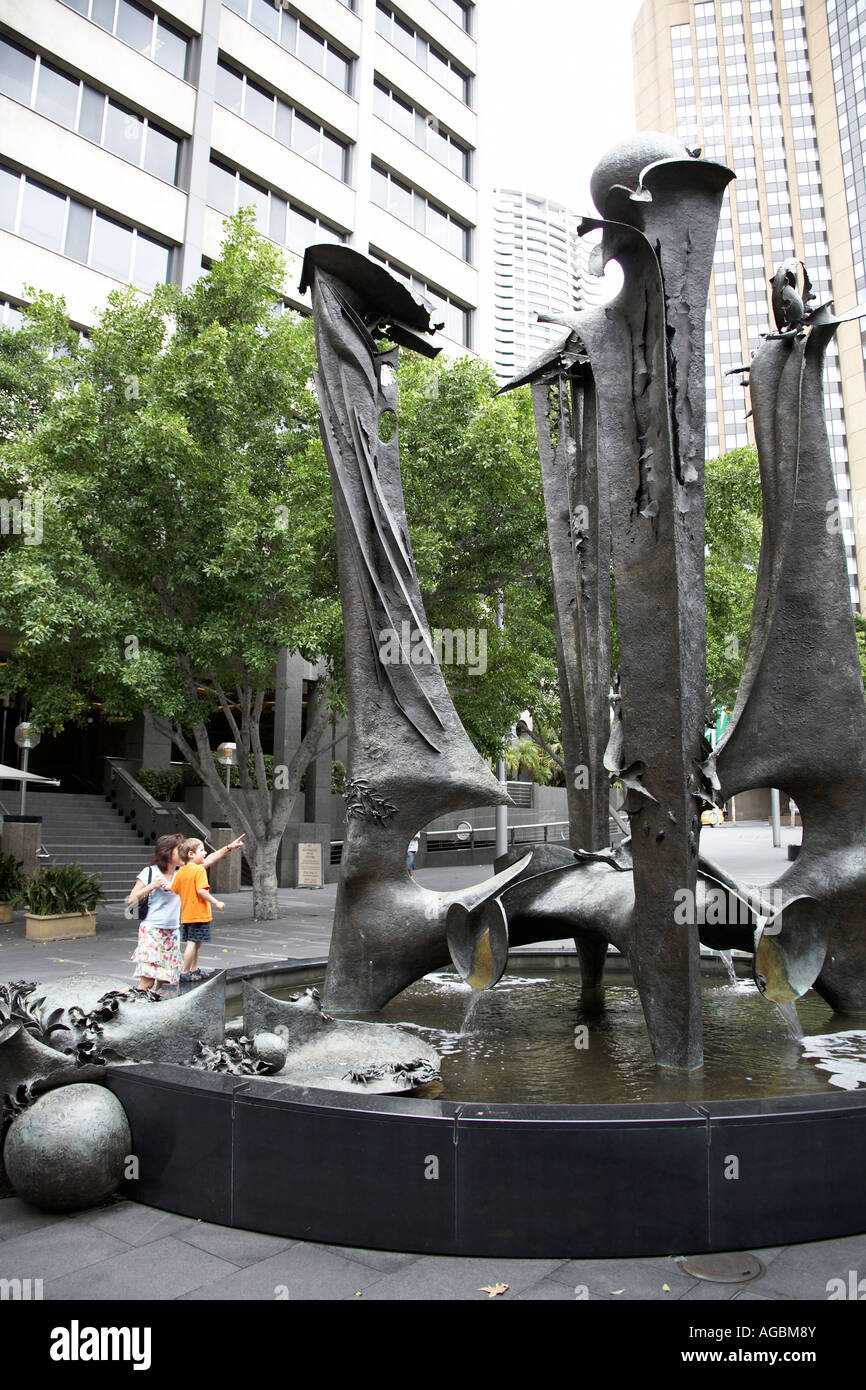 People by bronze sculpture fountains by Stephen Walker in Sydney New South Wales NSW Australia