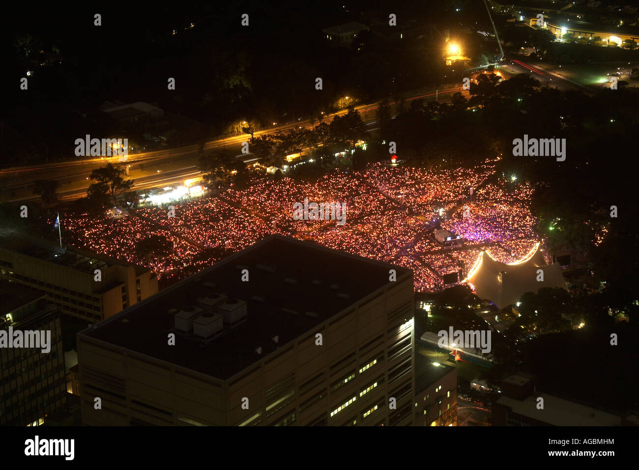 High level oblique aerial view north east of outdoor concert with candle lights at dusk evening or twilight from Sydney Tower N Stock Photo