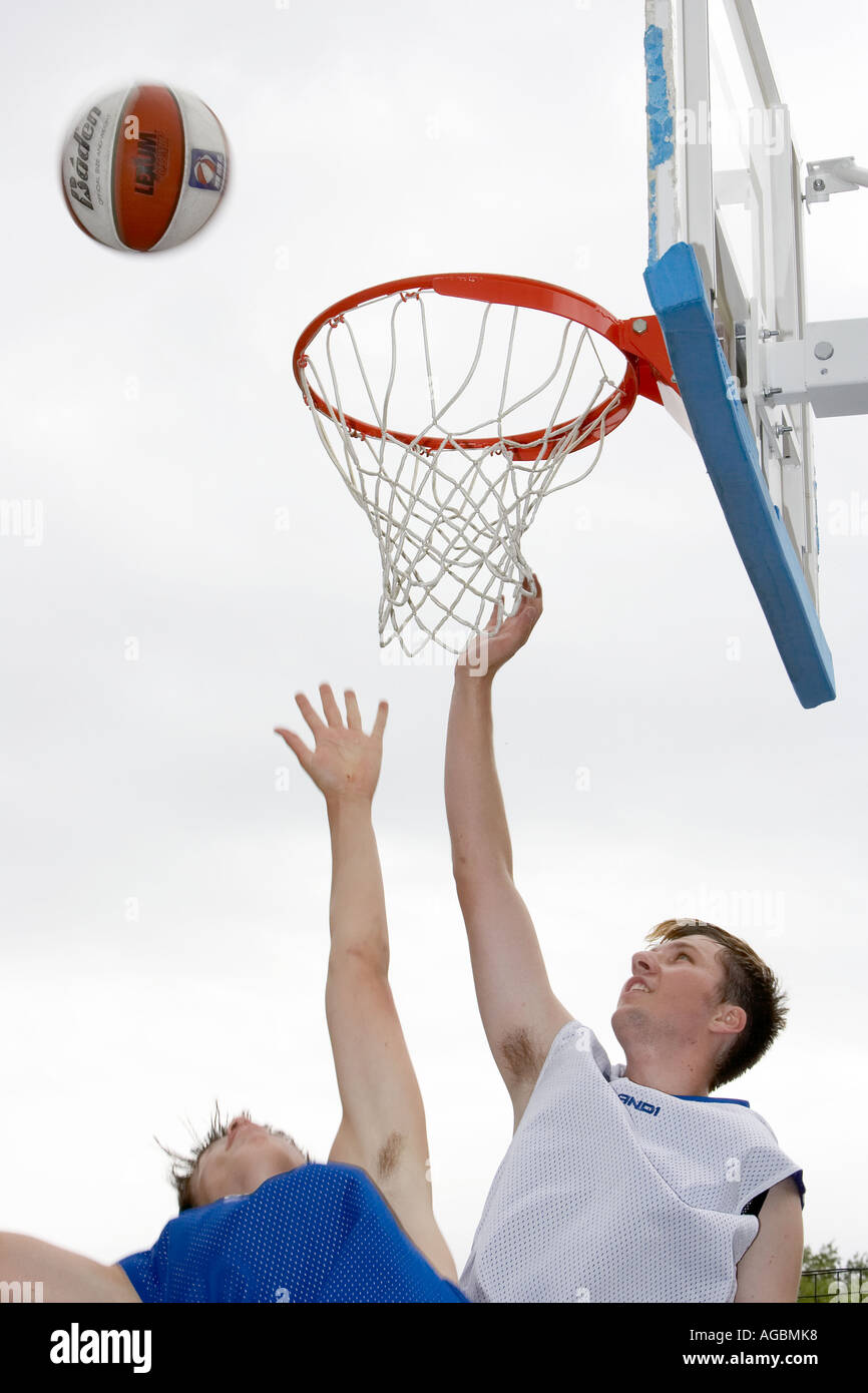 Two basketball players in action Stock Photo