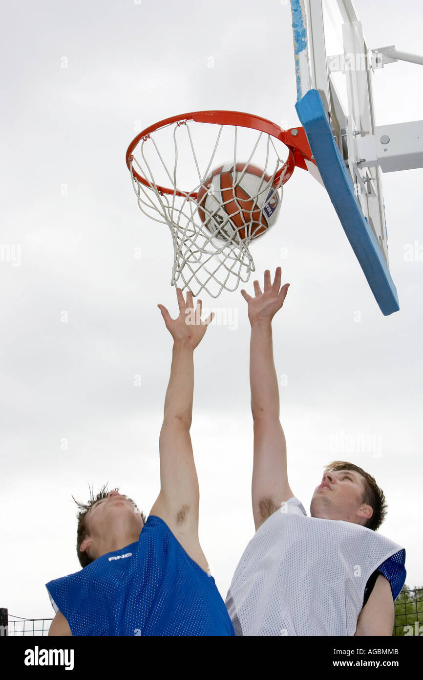 Two basketball players in action Stock Photo