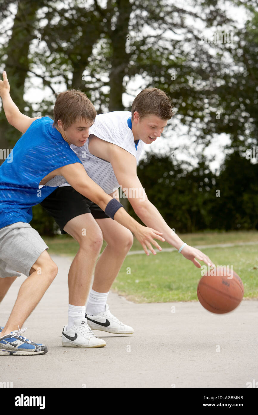 Two basketball players in action Stock Photo