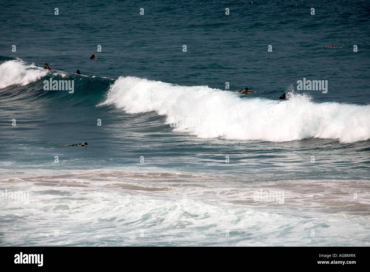 People swimming and waiting for surf waves at Bondi Beach Sydney New South Wales NSW Australia Stock Photo