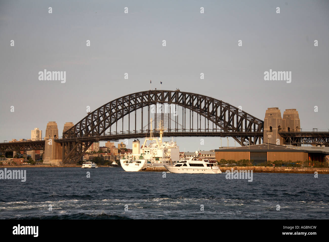 Merchant ship vessel and Harbour Bridge from Darling Harbour in Sydney
