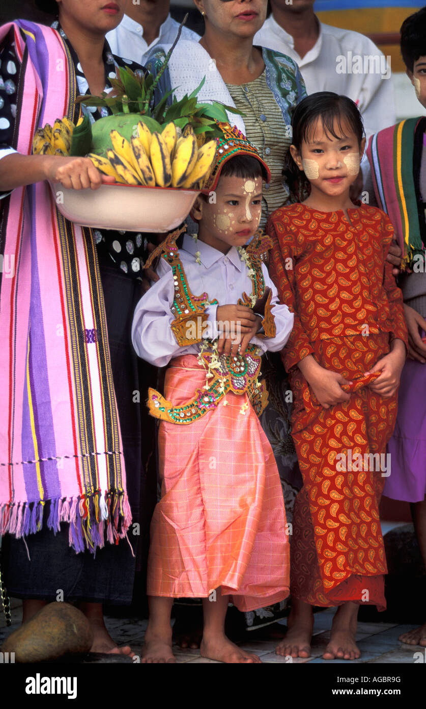 Myanmar, Yangon, Boy and girl in traditional clothing during shin puy  ceremony Stock Photo - Alamy