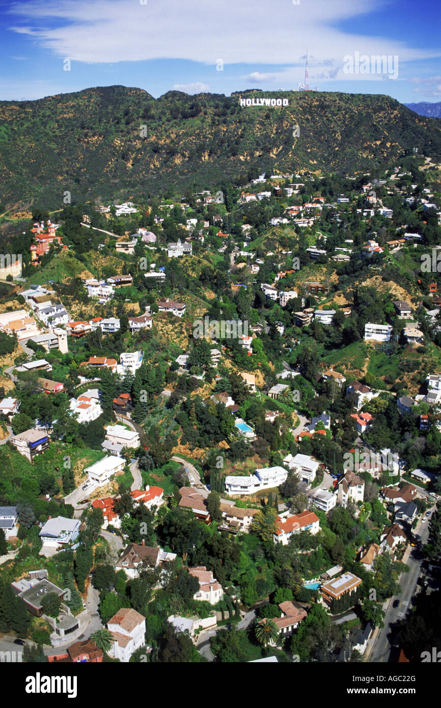 Aerial view of exclusive hillside homes below Hollywood sign in Hollywood Hills along base of Santa Monica Mountains  California Stock Photo