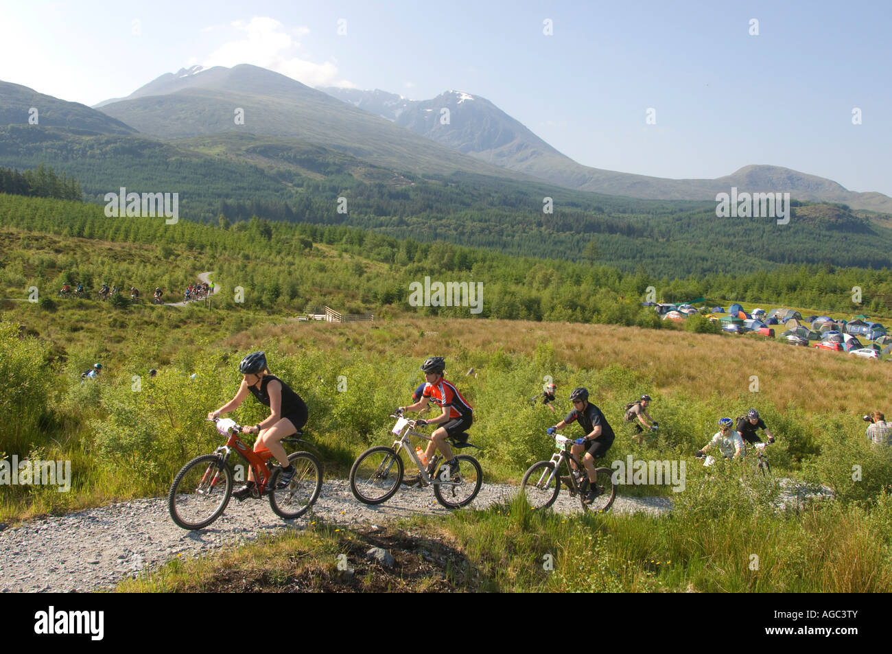 Competitors in the 10 under the Ben endurance mountain bike race, near Fort William, Scotland. With Ben Nevis in the background. Stock Photo
