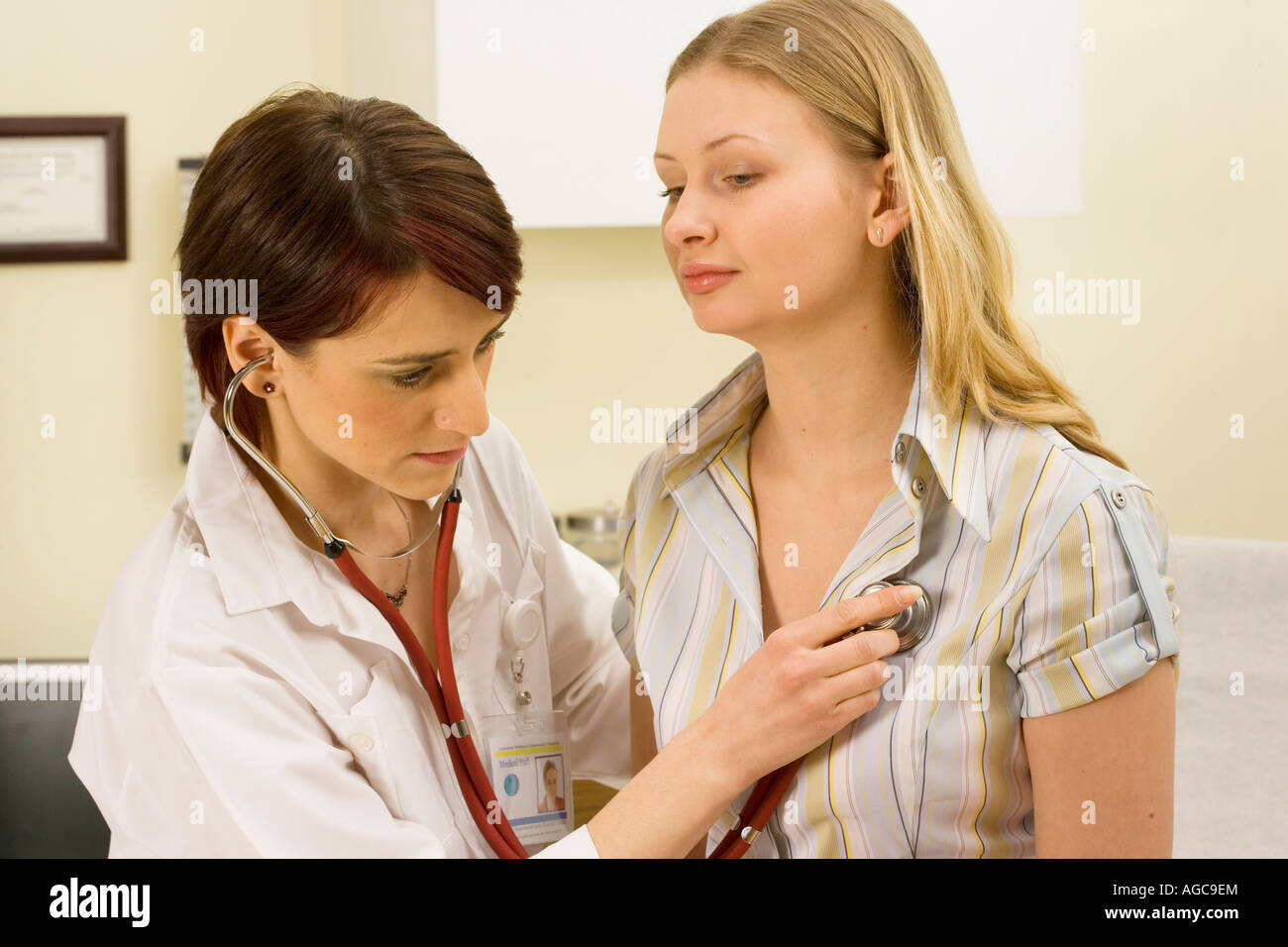 Doctor listens to the sounds inside patient's body using a Stock Photo - Alamy Doctor listens to the sounds inside patient's body using a Stock Photo - Alamy