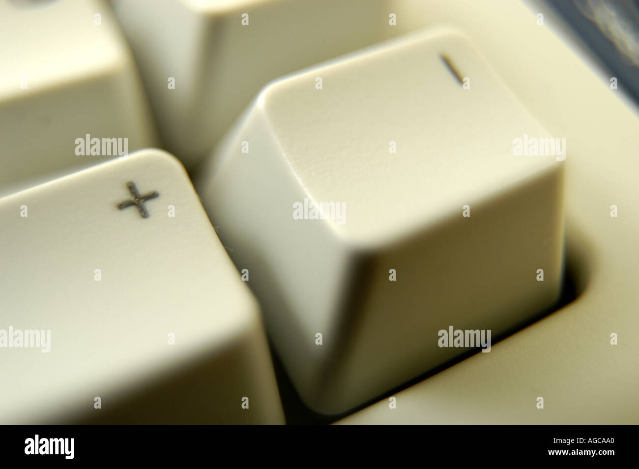 White computer keyboard plus minus keys Stock Photo - Alamy