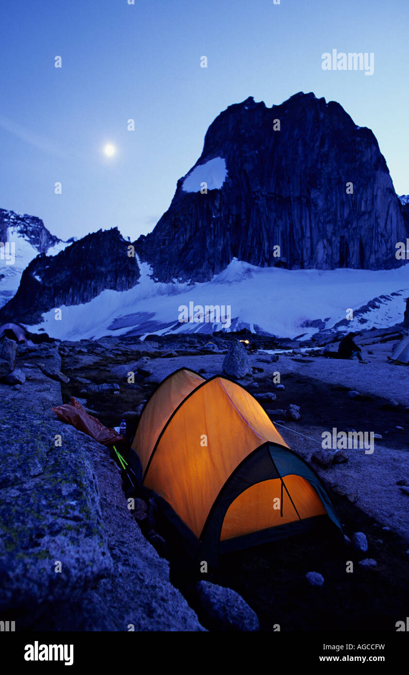 Illuminated tent Appelby climber's camp Snow Patch Spire Bugaboo Glacier Provincial Park British Columbia Canada Stock Photo