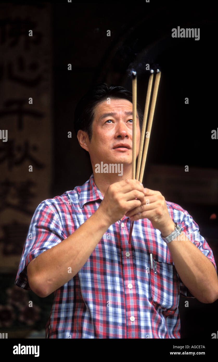 Burning incense singapore hi-res stock photography and images - Alamy