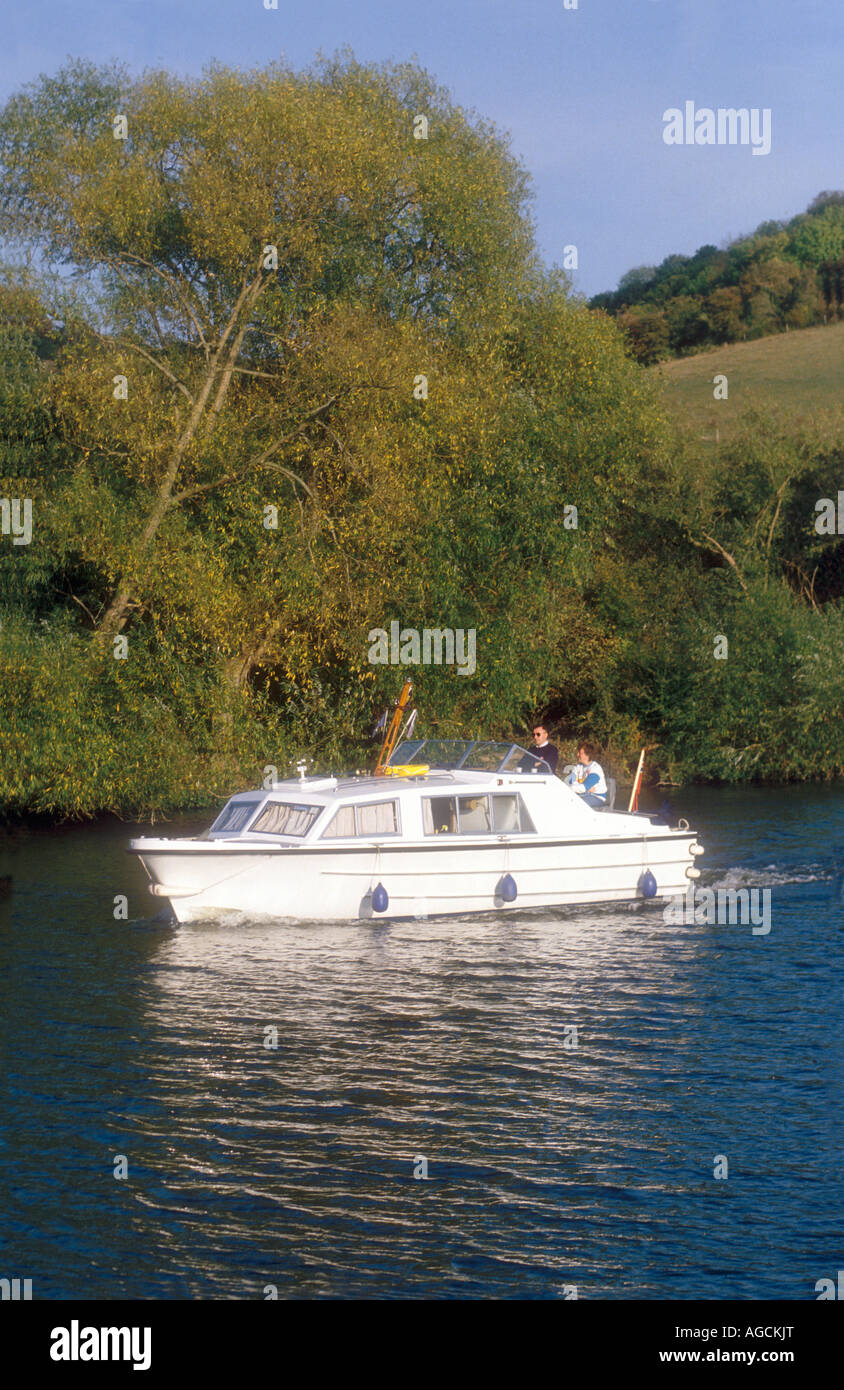 A motor cruiser on the River Thames near Lower Basildon in Berkshire England UK Stock Photo