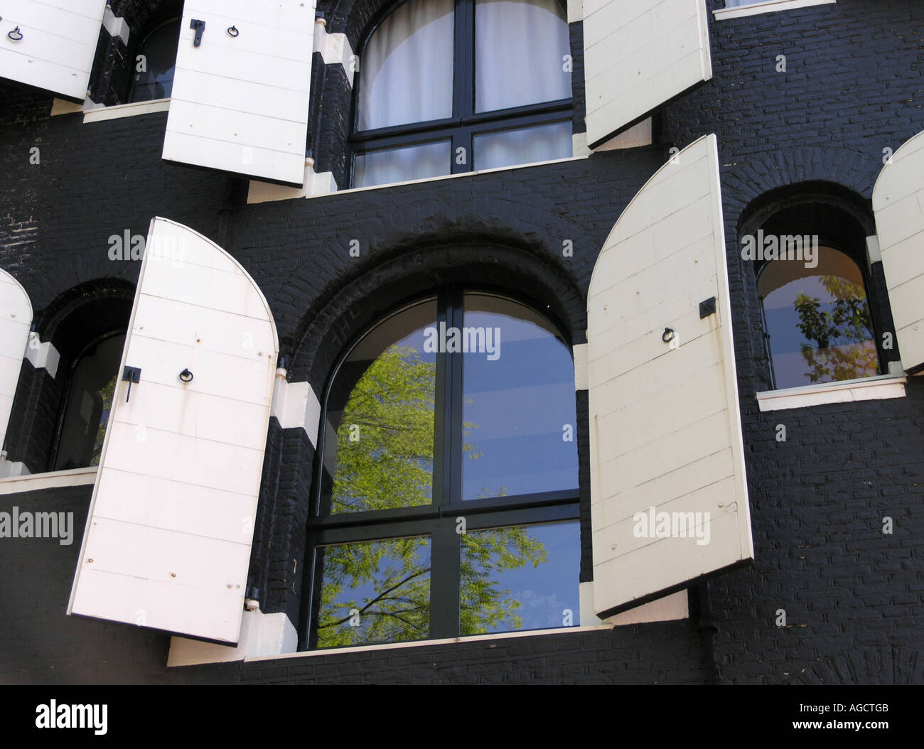 White windows black shutters hi-res stock photography and images - Alamy