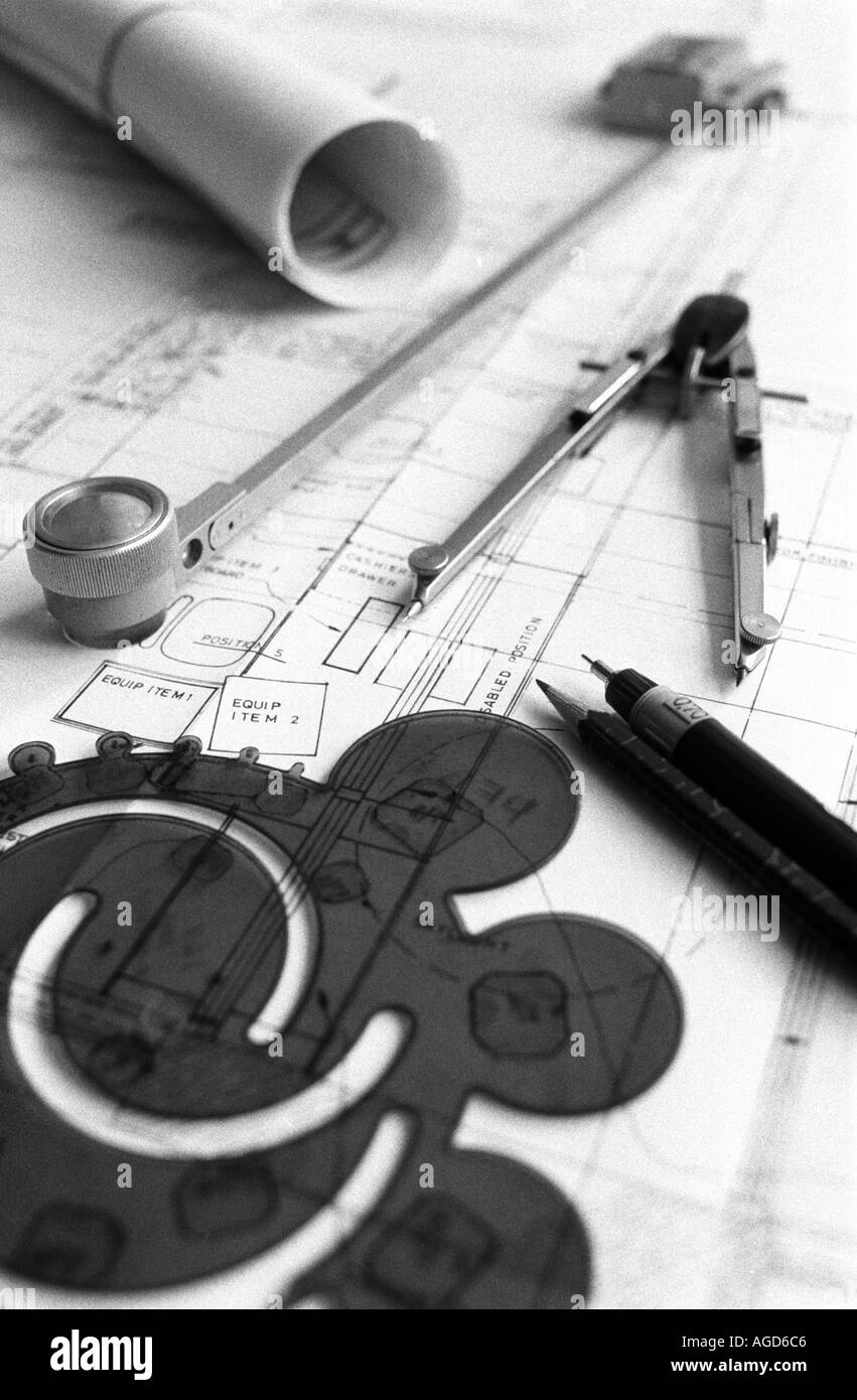 Drawing instruments of an architect on plans for the building of an office. Stock Photo