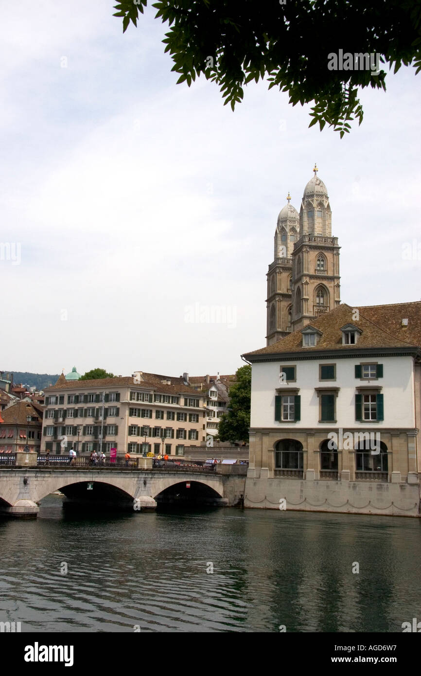 Munster Bridge crossing the Limmat River in Zurich, Switzerland with towers of Grossmunster church in background. Stock Photo