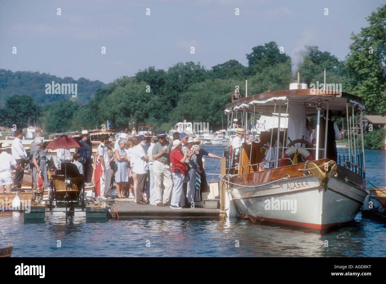 People board the restored 1883 Horsham and Co steam boat Alaska at the Thames Traditional Boat Rally Henley England UK Stock Photo