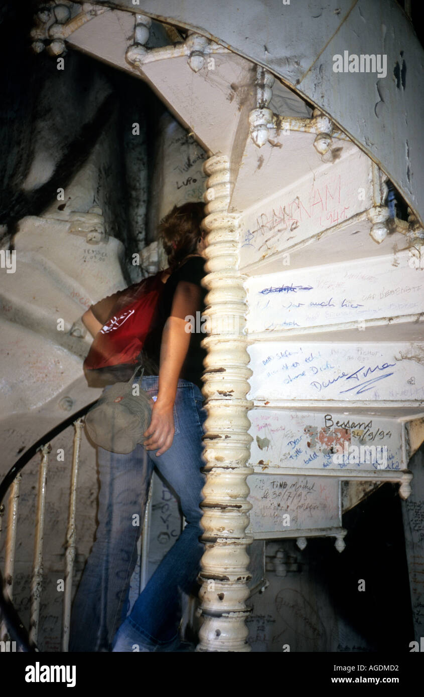 Le Puy en Velay tourist climbing inside statue Notre Dame de France