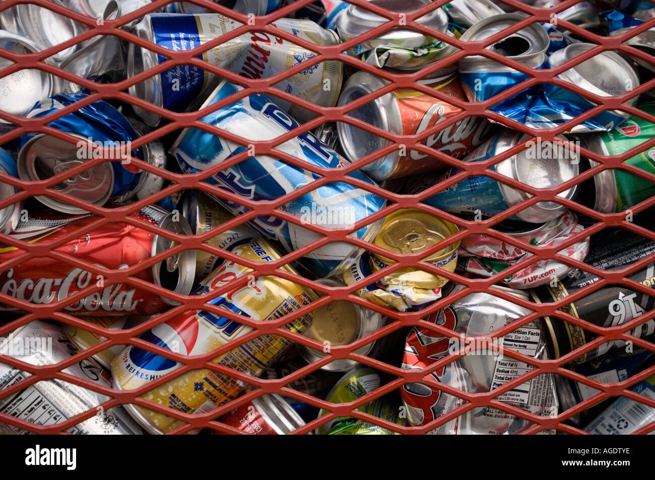 Cans in a red recycling bin Stock Photo Alamy