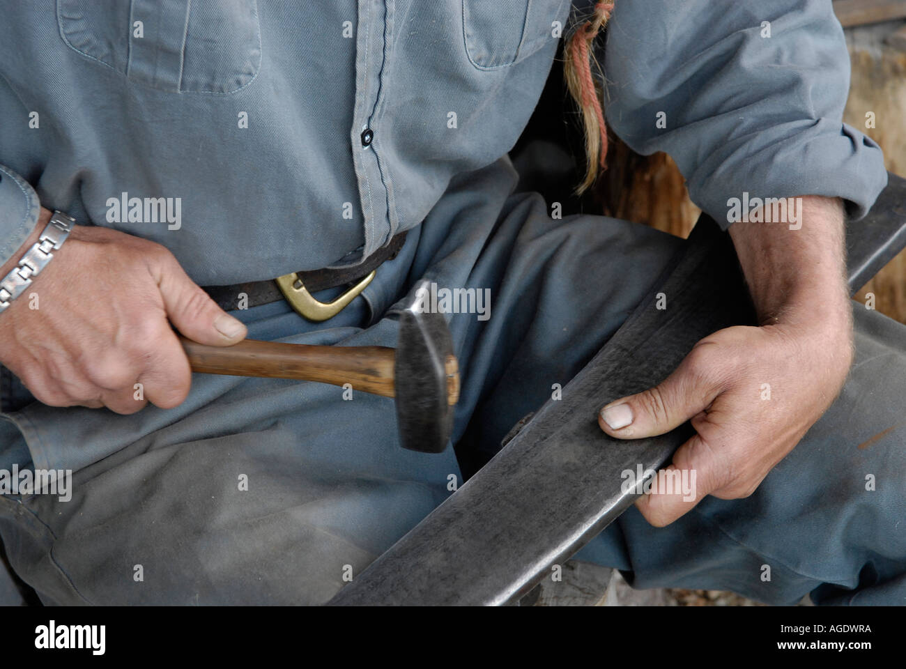 Scythe sharpening hires stock photography and images Alamy