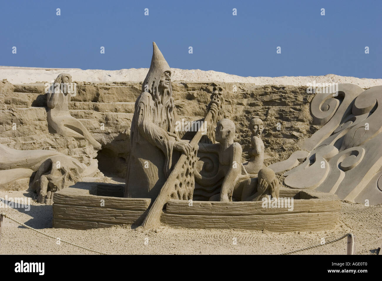 Sand sculpture of Charon, the ferryman of the dead in ancient Greek mythology. Stock Photo