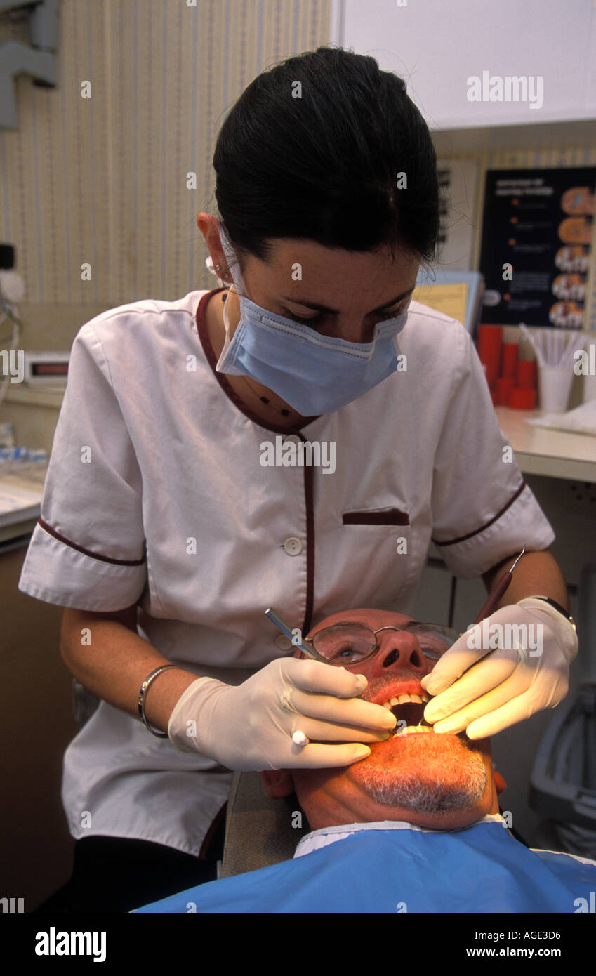 Dental hygienist at work London UK Stock Photo Alamy