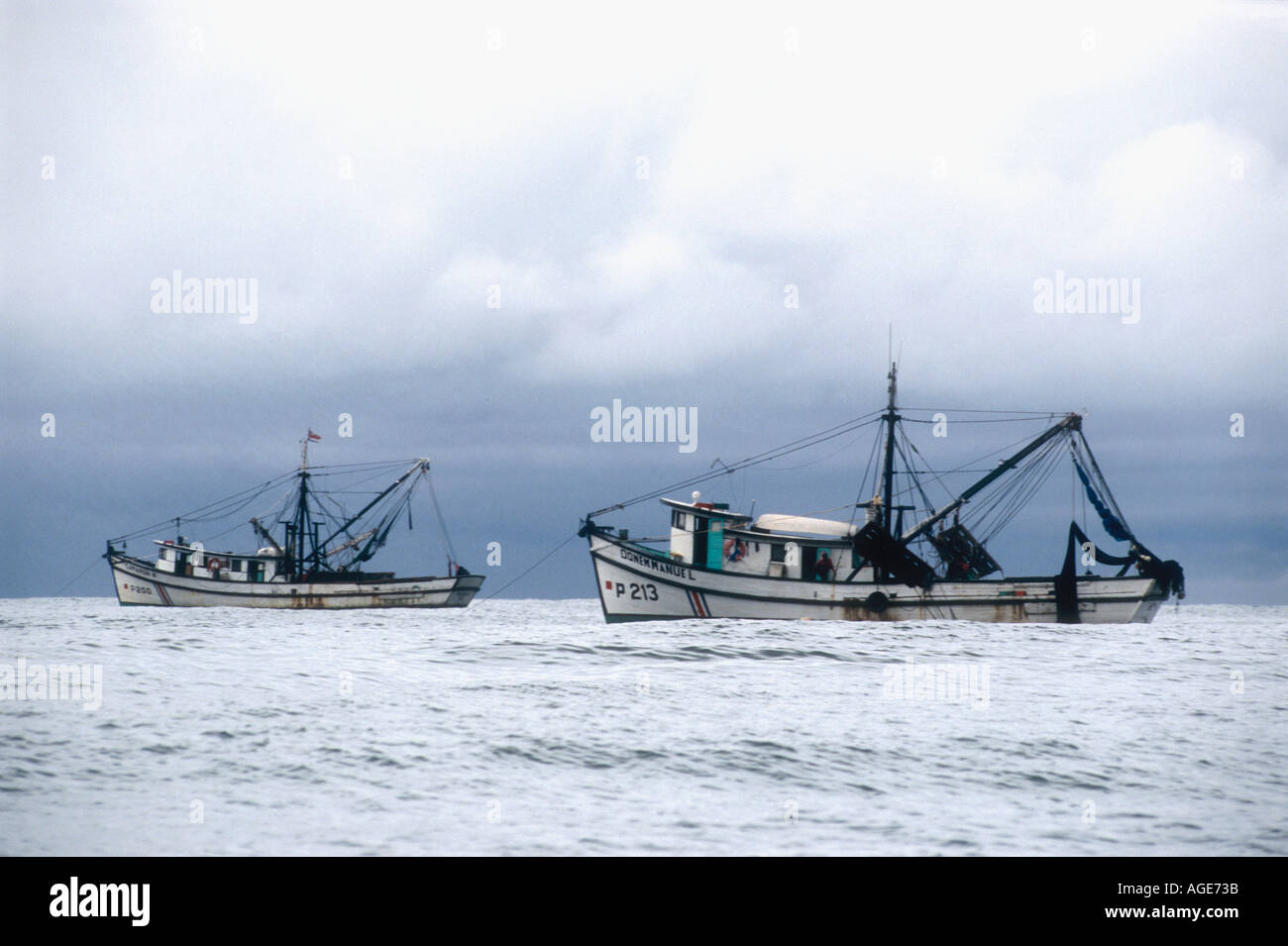 Beam trawler fishing vessels moored off Quepos Puntarenas Costa Rica Central America Stock Photo