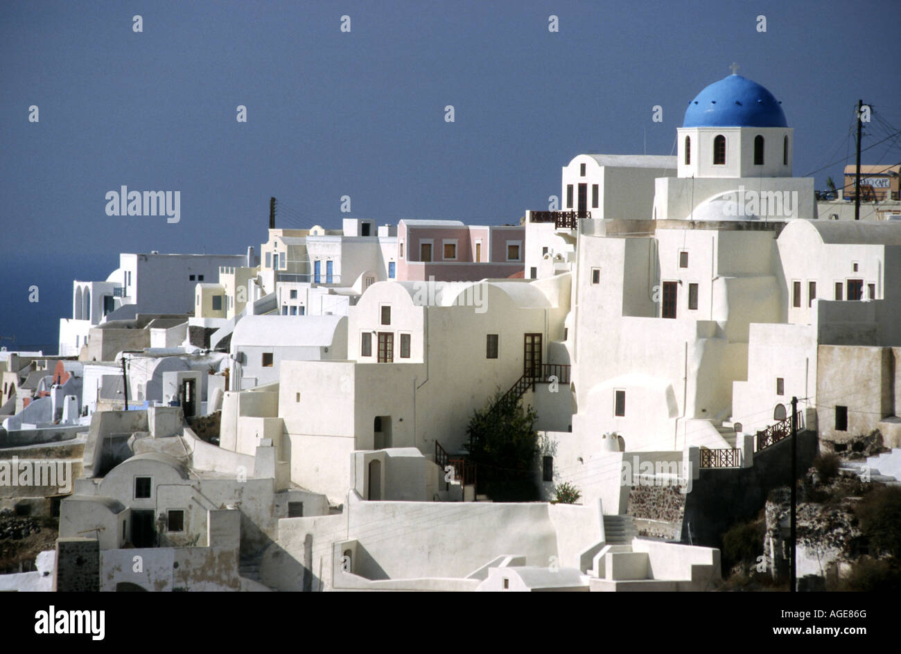 The blue domes of Oia stand our against the whitewashed buildings on Santorini. Stock Photo