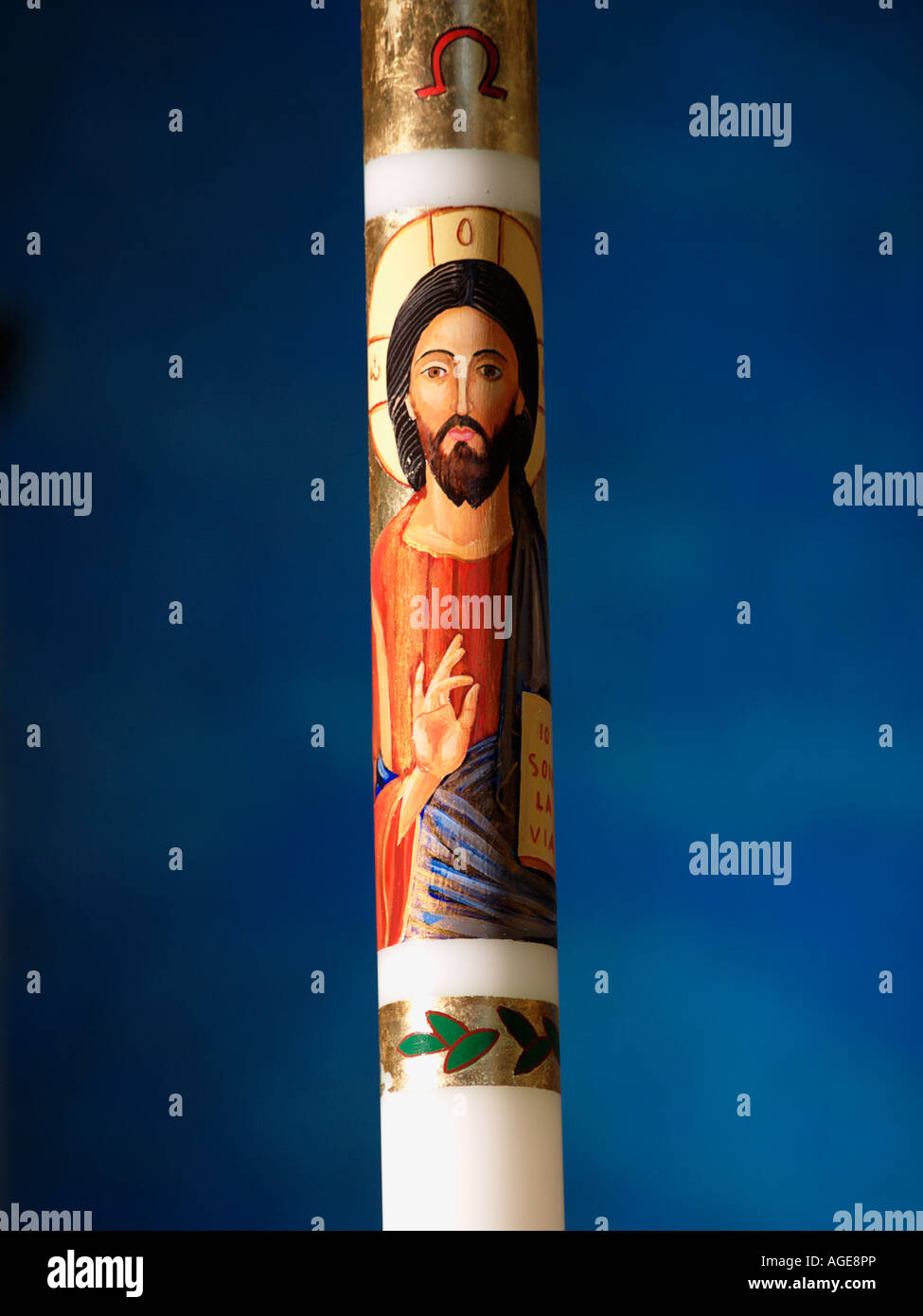 candle in church with picture of Jesus christ Stock Photo Alamy