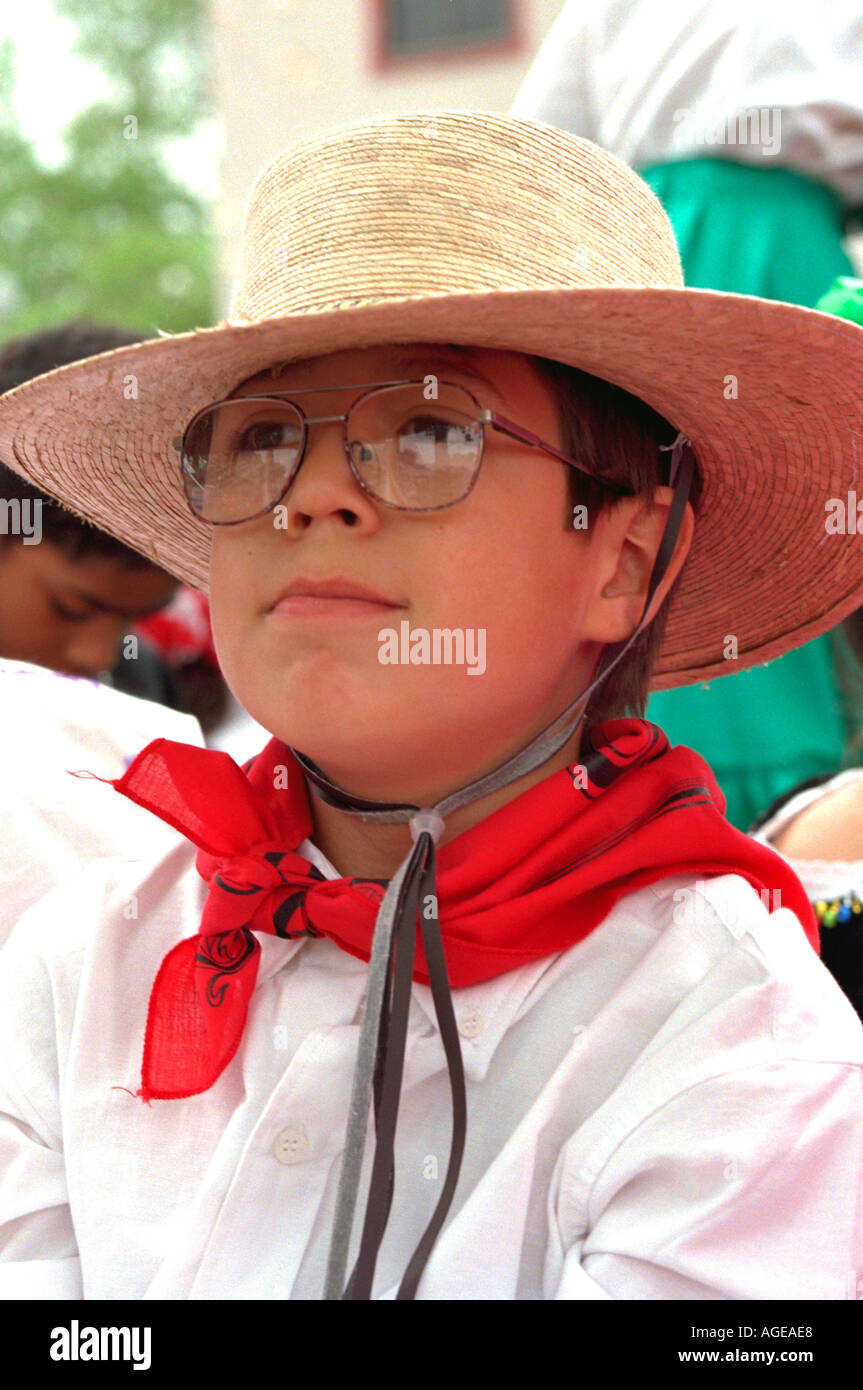 Latino boy age 10  in ethnic clothing at annual Cinco De Mayo festival. St Paul Minnesota USA Stock Photo