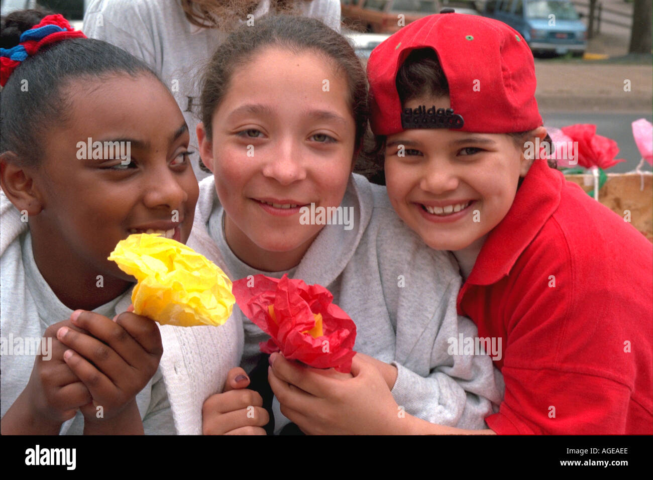 Latino and Black friends age 12  at annual Cinco De Mayo Festival. St Paul Minnesota USA Stock Photo