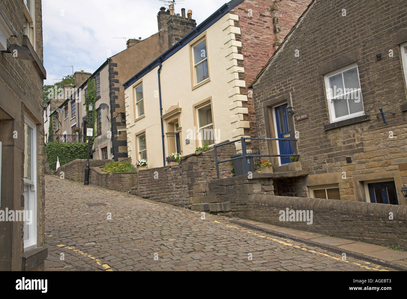 Row of terraced cottage houses Chapelen leFrith Peak district national park Debyshire England