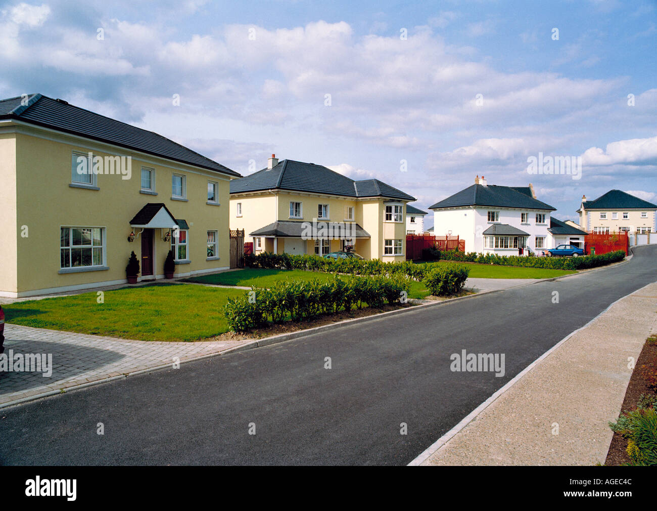Large modern detached homes on a housing estate in Ireland Stock Photo