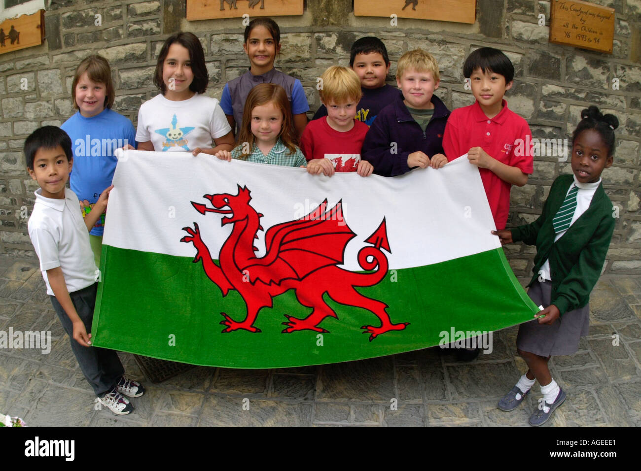 Pupils of Albert Primary School Penarth Vale of Glamorgan gather around the Red Dragon Wales UK Stock Photo