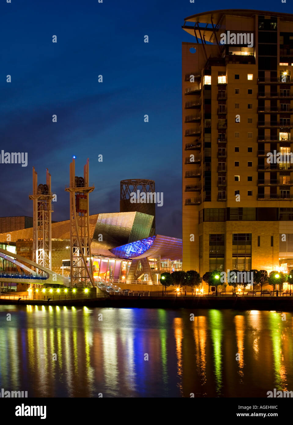 The Lowry Centreand Imperial Point Building at Night, Salford Quays, Greater Manchester, England, UK Stock Photo