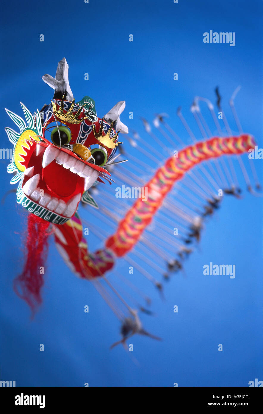 Flying oriental dragon kite on sky background Stock Photo