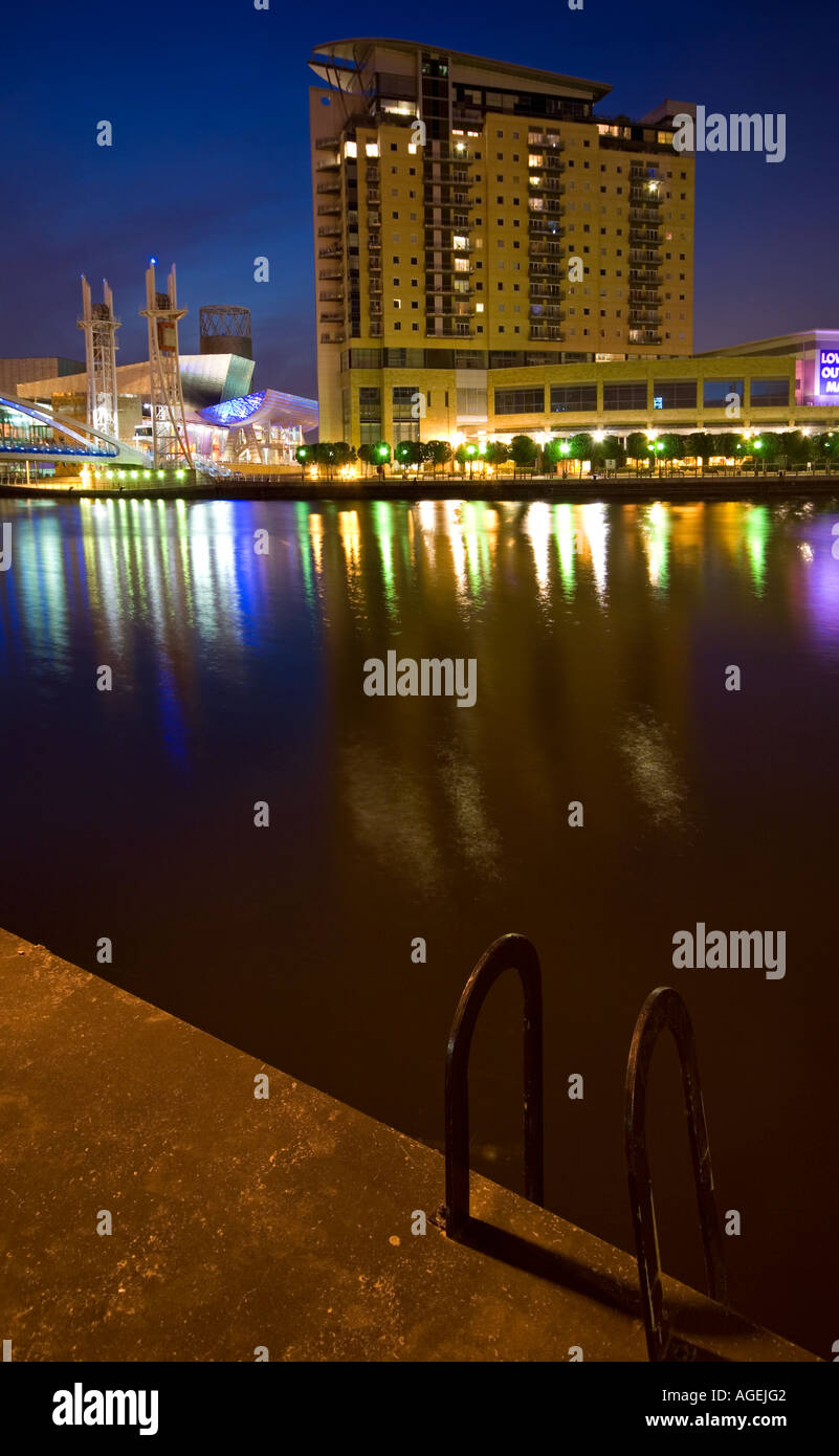 The Lowry Centre and Imperial Point Apartment Building at Night, Salford Quays, Greater Manchester, England, UK Stock Photo