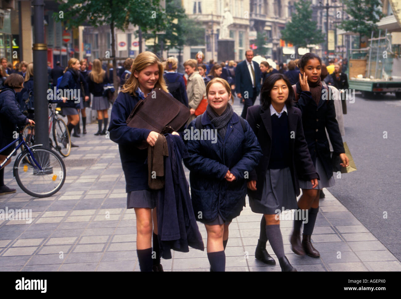 Belgian people female students wearing school uniform walking along The ...