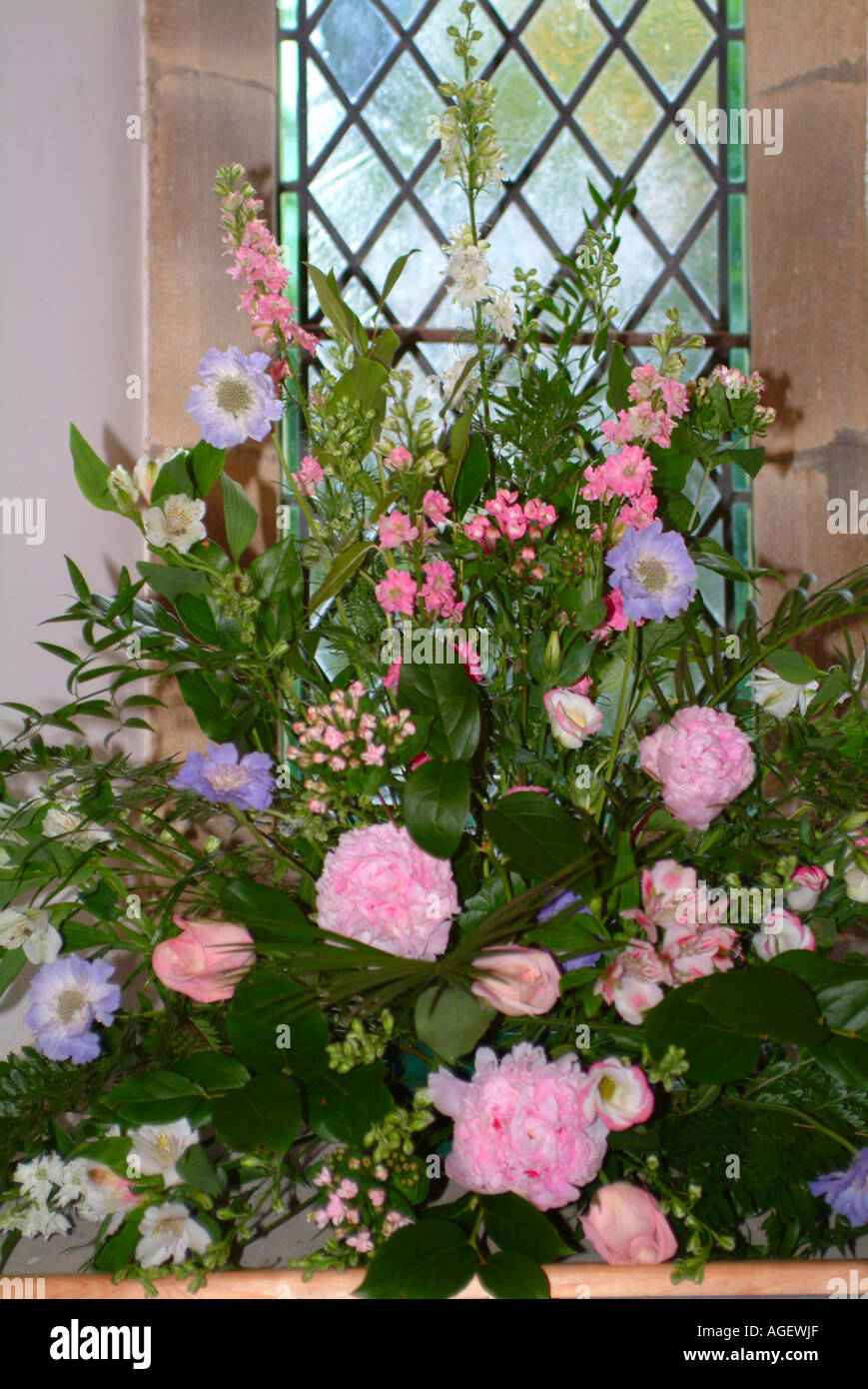Flower Arrangement On Window Ledge Inside Church Prior To A