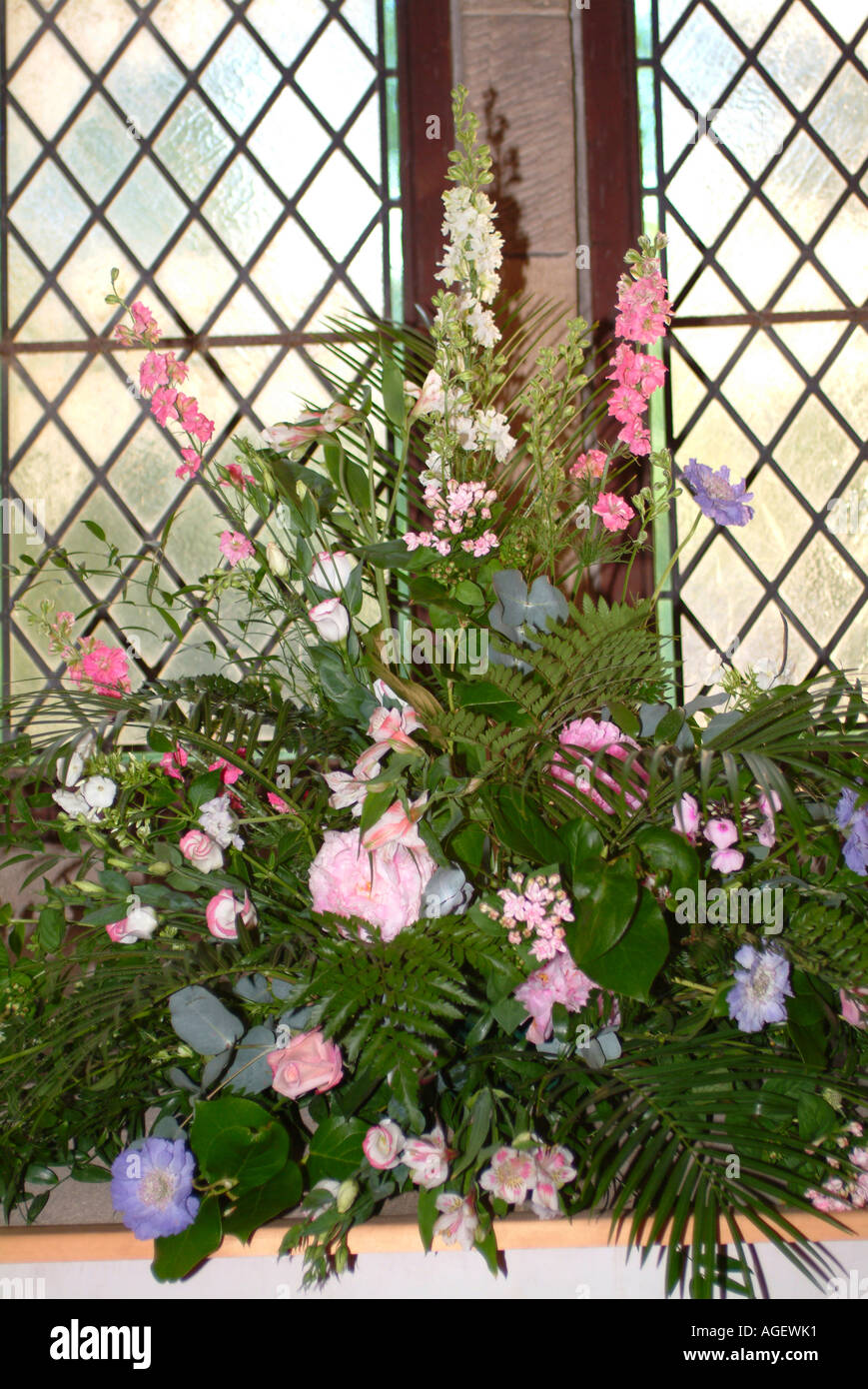 Flower Arrangement On Window Ledge Inside Church Prior To A