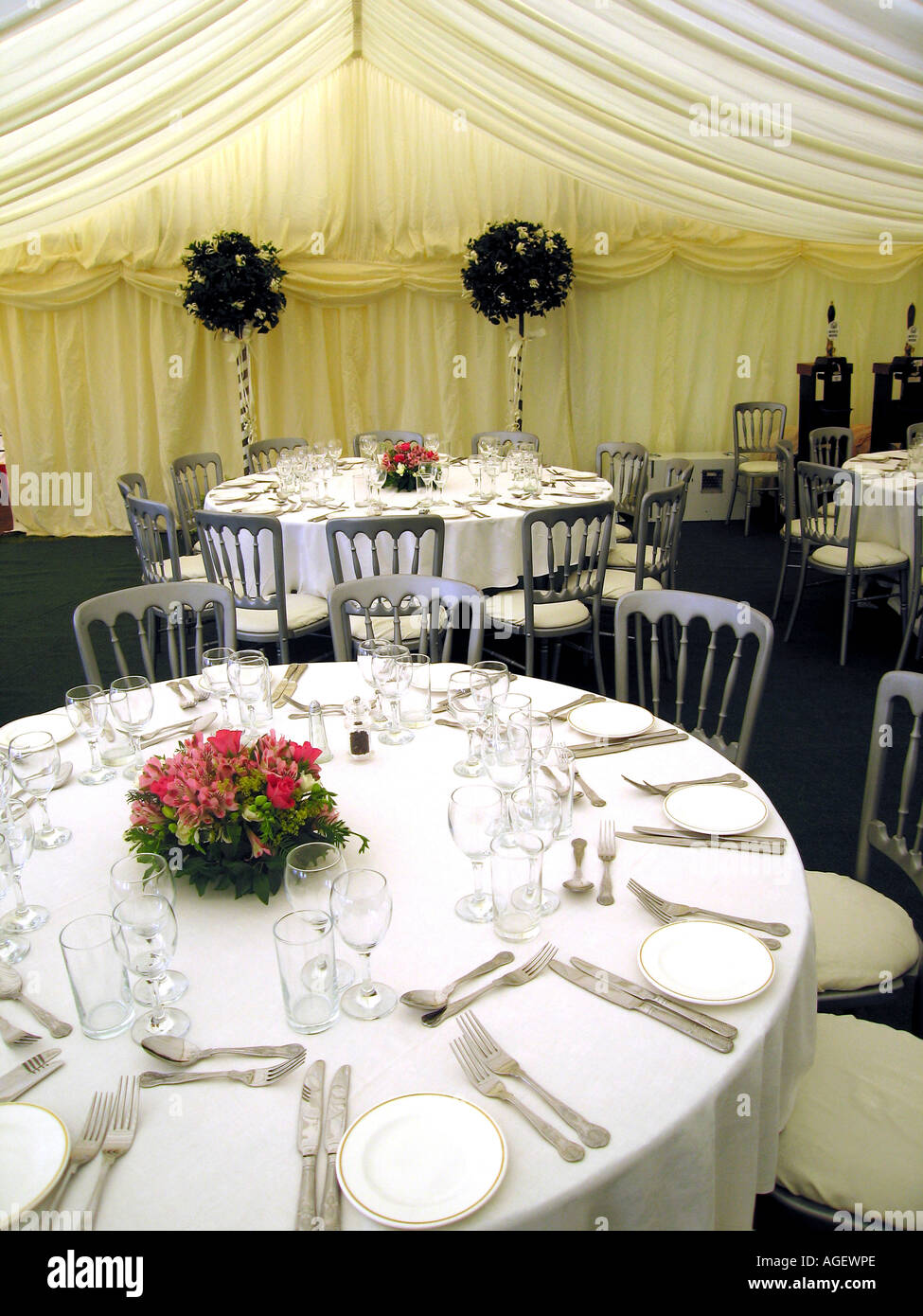 Tables Set Up For Wedding Reception in Marquee in Northumberland Garden Stock Photo