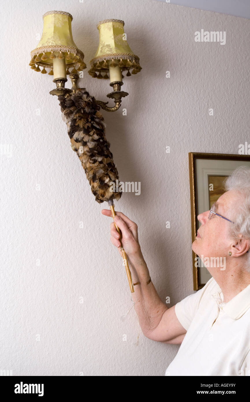 Woman dusting Stock Photo Alamy