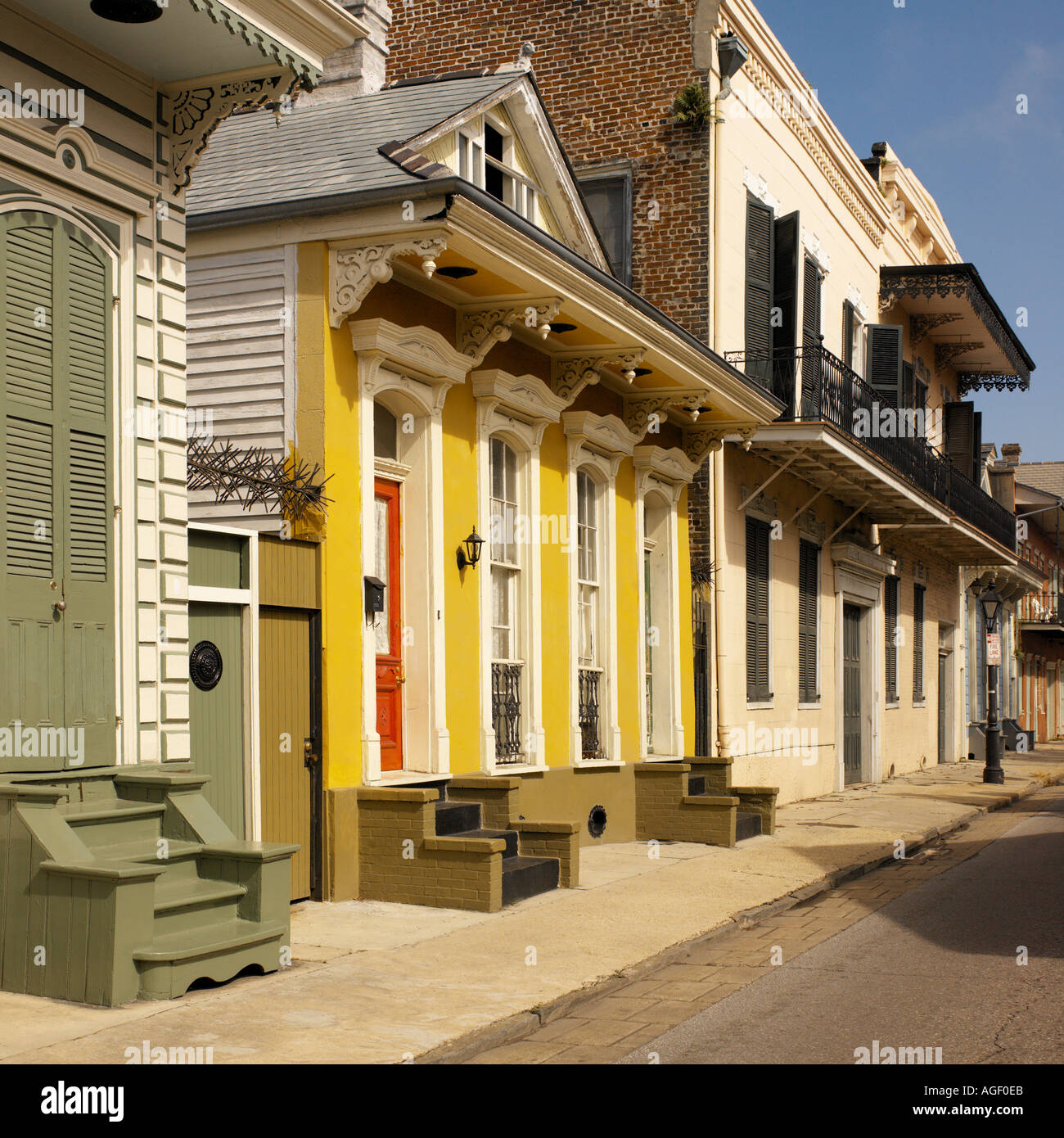 Row of Shotgun Houses on Bourbon Street in the French Quarter of New Orleans, USA Stock Photo