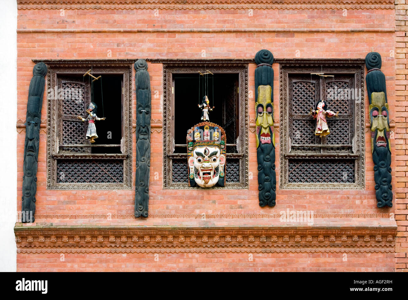 Nepalise masks and puppets in a window. Durbar Square, Kathmandu, Nepal Stock Photo