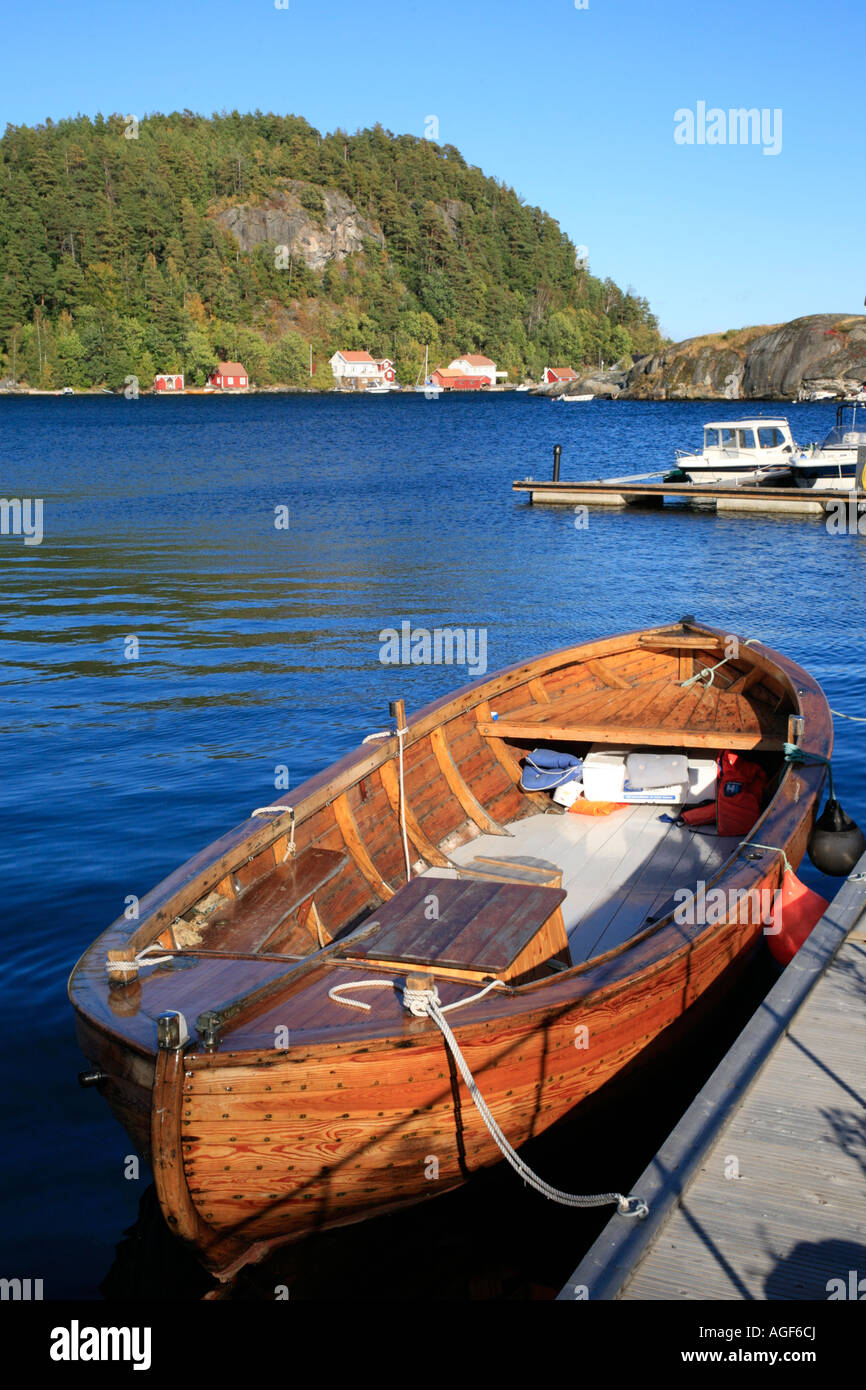 boat at a landing stage near Kragero in the South of Norway Stock Photo