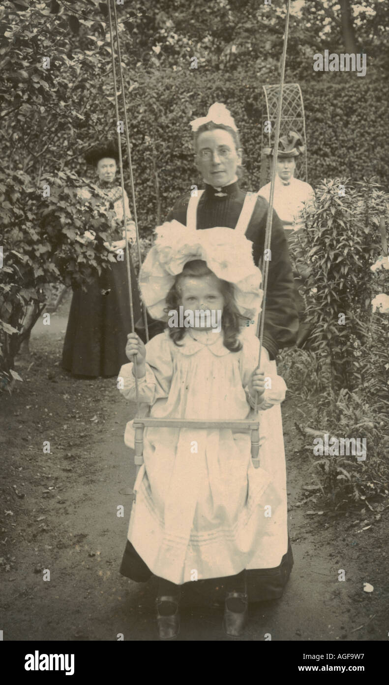 Cabinet photograph of three generations in garden circa 1890 Stock Photo