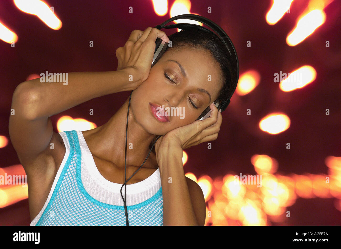 Asian woman wearing headphones Stock Photo